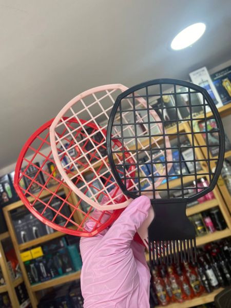 Planeta del barbero - raqueta de rulos